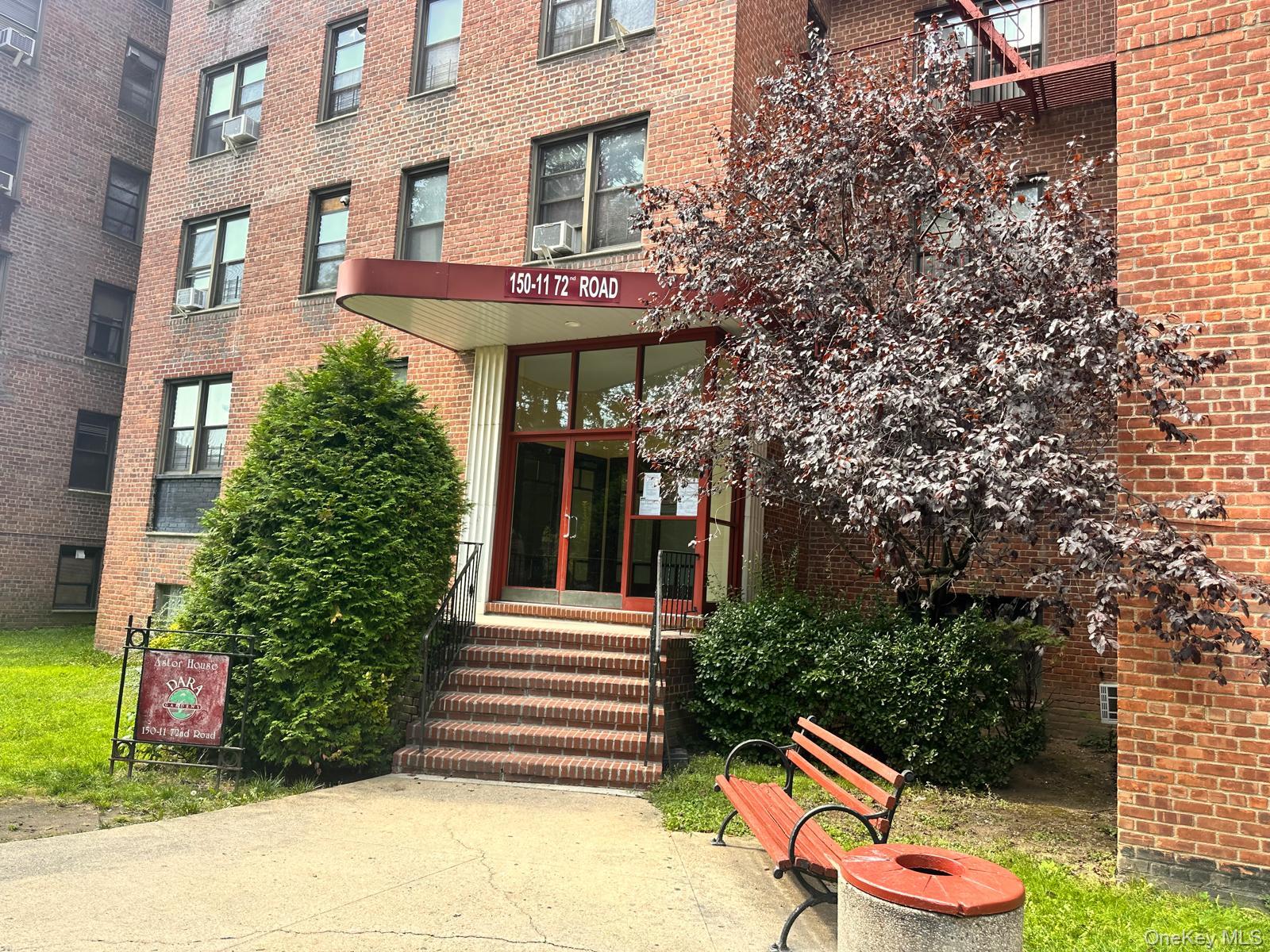 150-11 72nd Road, Unit 6F Queens, NY 11367 - Photo 4 of 31 a view of a brick building with many windows