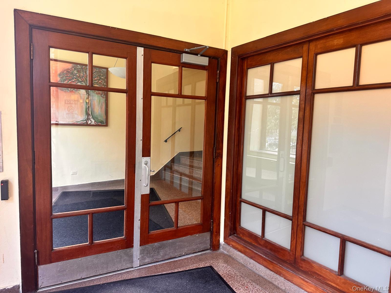 150-11 72nd Road, Unit 6F Queens, NY 11367 - Photo 5 of 31 a view of front door