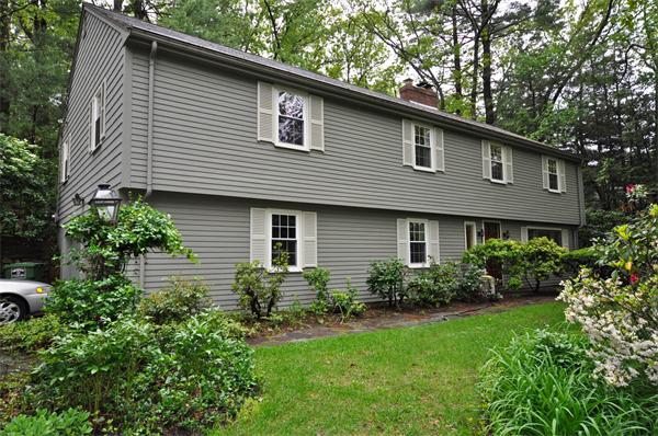 37 Oak Hill Road Wayland, MA 01778 - Photo 1 of 22 a front view of a house with garden