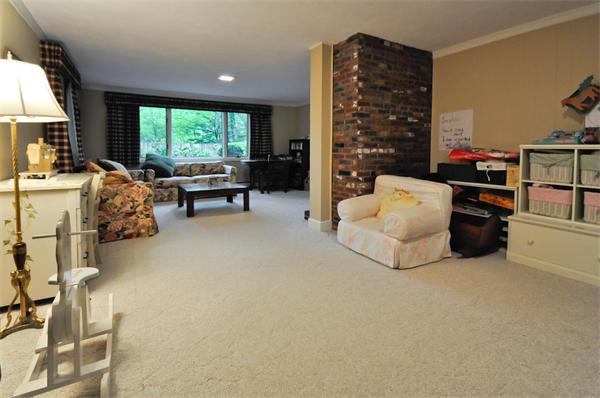 37 Oak Hill Road Wayland, MA 01778 - Photo 13 of 22 a bed room with a bed and a chair