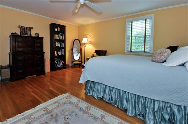 37 Oak Hill Road Wayland, MA 01778 - Photo 15 of 22 a bedroom with a bed and a closet
