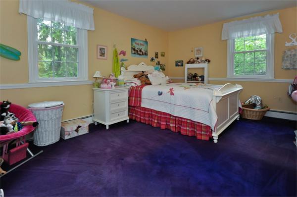 37 Oak Hill Road Wayland, MA 01778 - Photo 17 of 22 a bed room with a bed and a window
