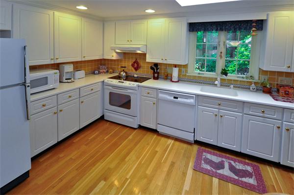 37 Oak Hill Road Wayland, MA 01778 - Photo 3 of 22 a kitchen with cabinets oven and a window