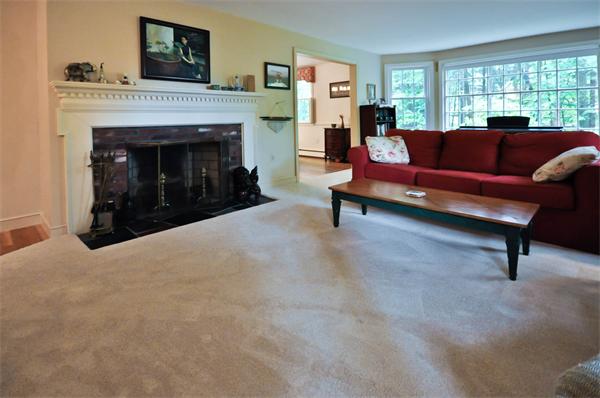 37 Oak Hill Road Wayland, MA 01778 - Photo 4 of 22 a living room with furniture and a fireplace
