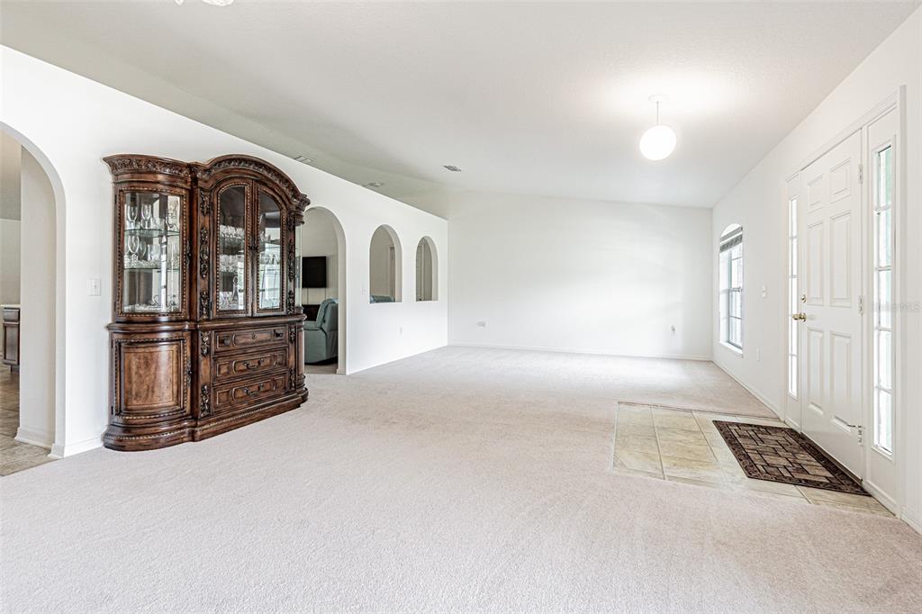 6283 Lorraine Lane Spring Hill, FL 34608 - Photo 11 of 27 a view of a storage & utility room with refrigerator