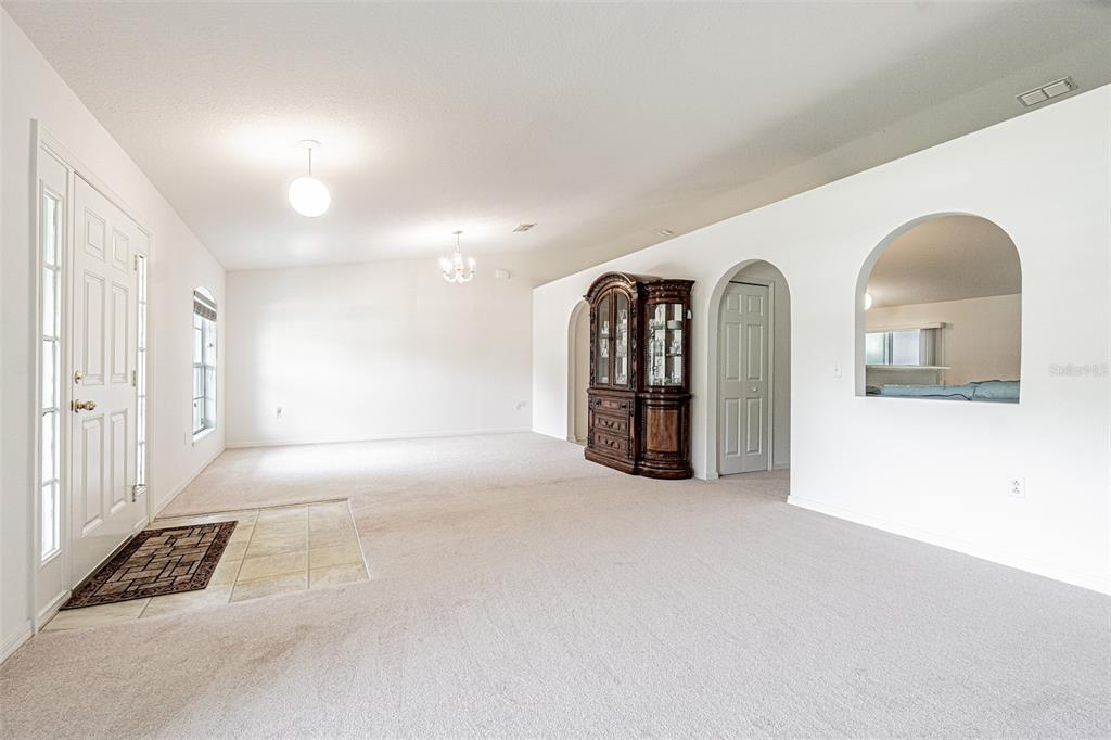 6283 Lorraine Lane Spring Hill, FL 34608 - Photo 10 of 27 a view of an empty room and glass door