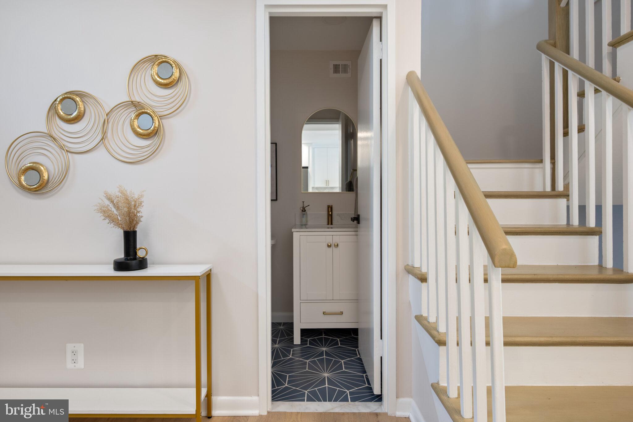1309 4th Street Southwest, Unit TH9 Washington, DC 20024 - Photo 18 of 63 a view of a hallway with wooden floor