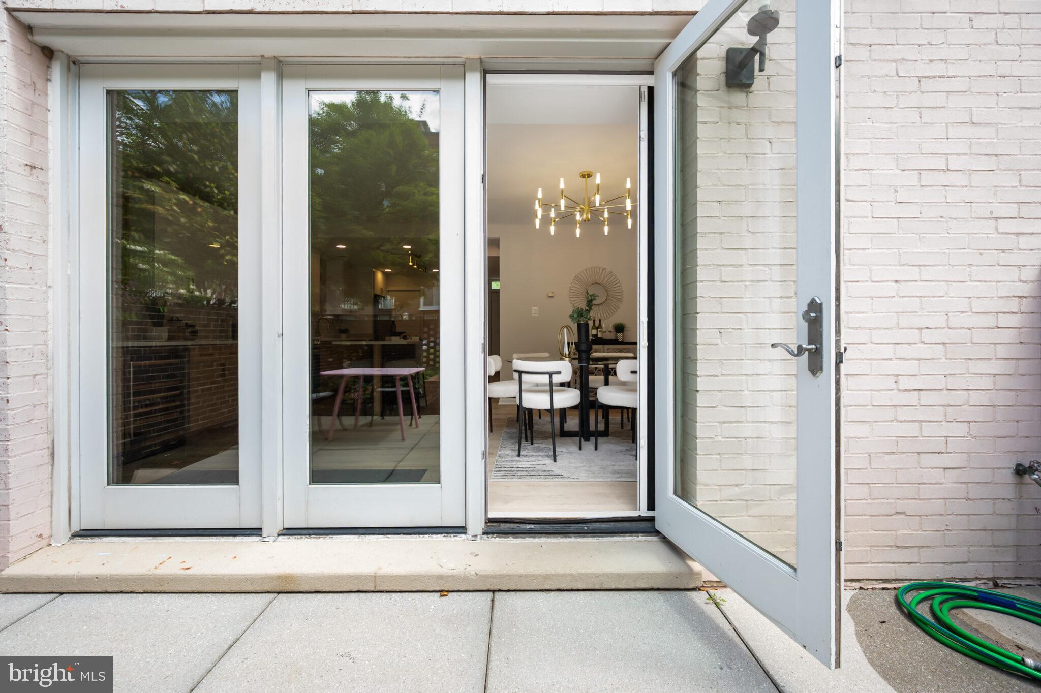 1309 4th Street Southwest, Unit TH9 Washington, DC 20024 - Photo 21 of 63 a view of a glass door and a window