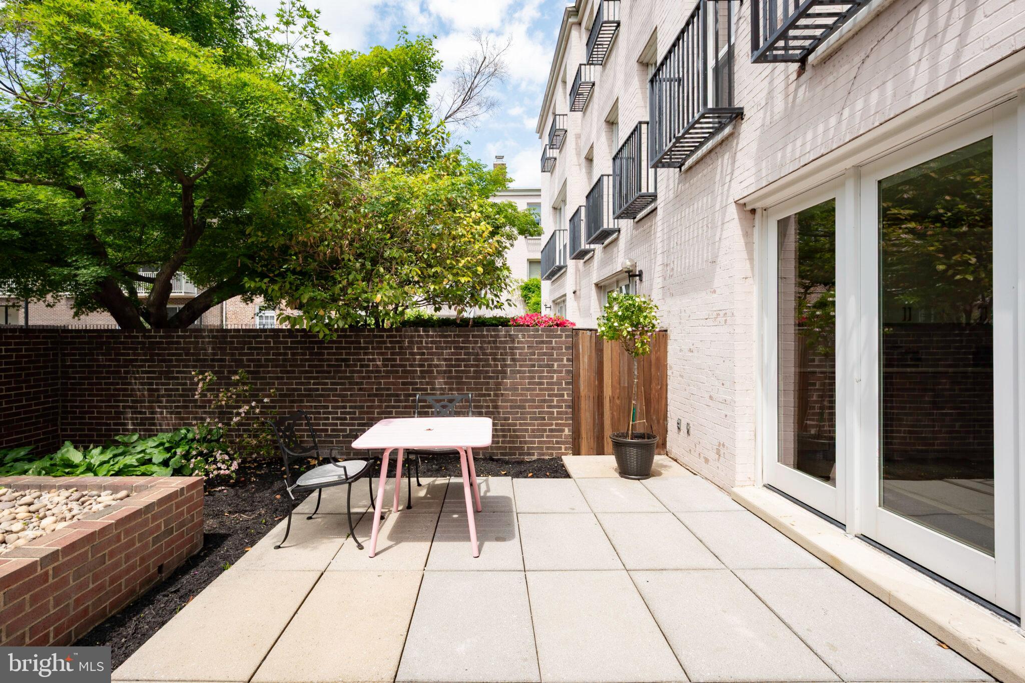 1309 4th Street Southwest, Unit TH9 Washington, DC 20024 - Photo 22 of 63 a view of backyard with sitting area