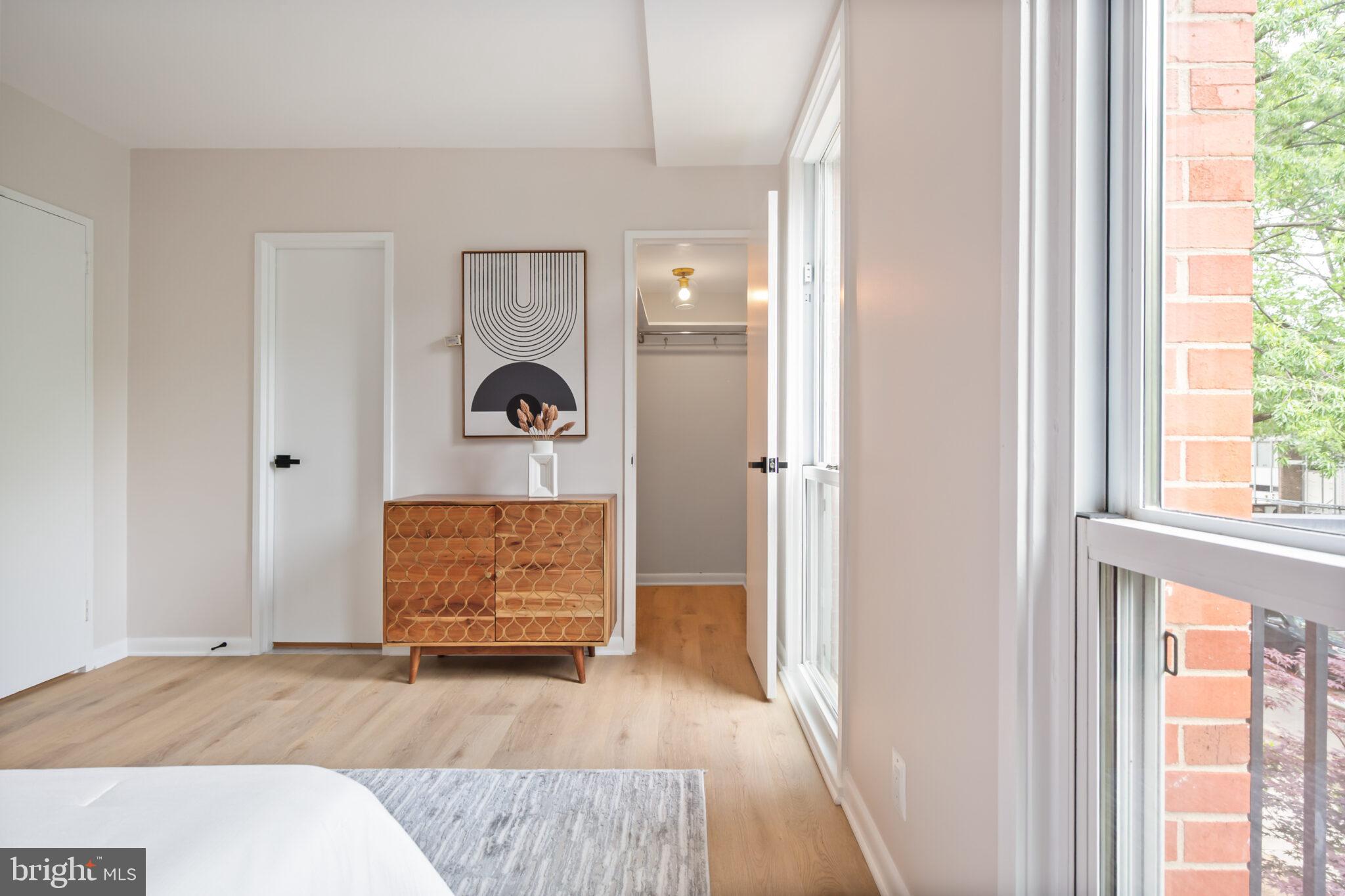 1309 4th Street Southwest, Unit TH9 Washington, DC 20024 - Photo 32 of 63 a view of entryway with wooden floor and window