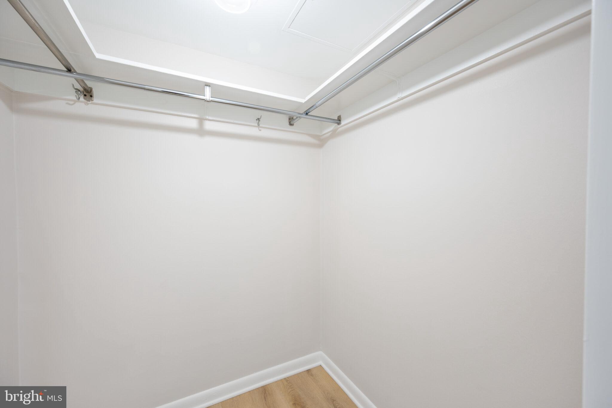 1309 4th Street Southwest, Unit TH9 Washington, DC 20024 - Photo 39 of 63 a view of a room with racks on the wall