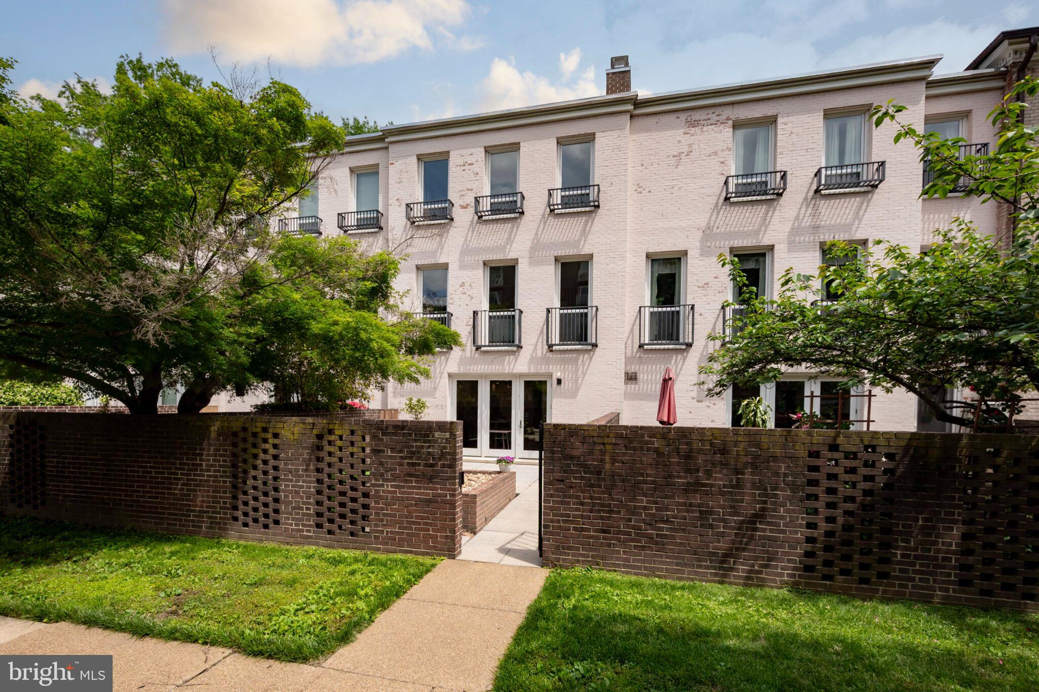 1309 4th Street Southwest, Unit TH9 Washington, DC 20024 - Photo 44 of 63 front view of a house with a yard