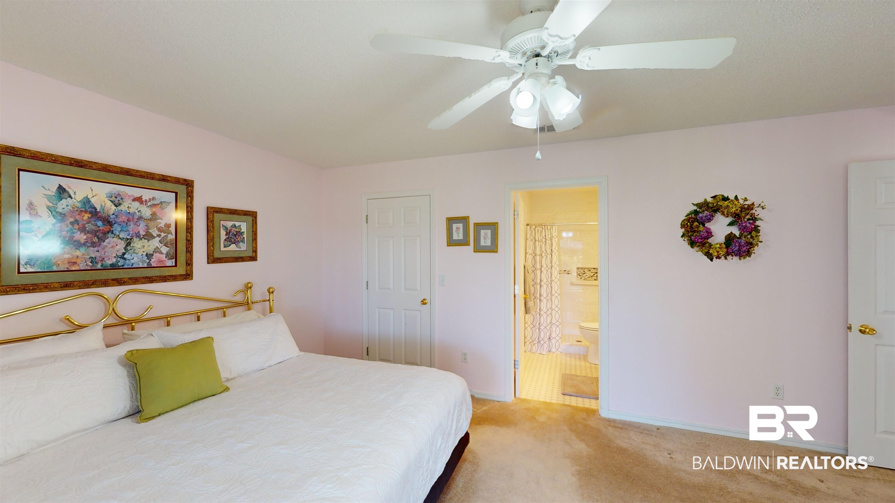 9445 Villas Drive Foley, AL 36535 - Photo 11 of 20 Bedroom featuring ceiling fan, connected bathroom, and light carpet