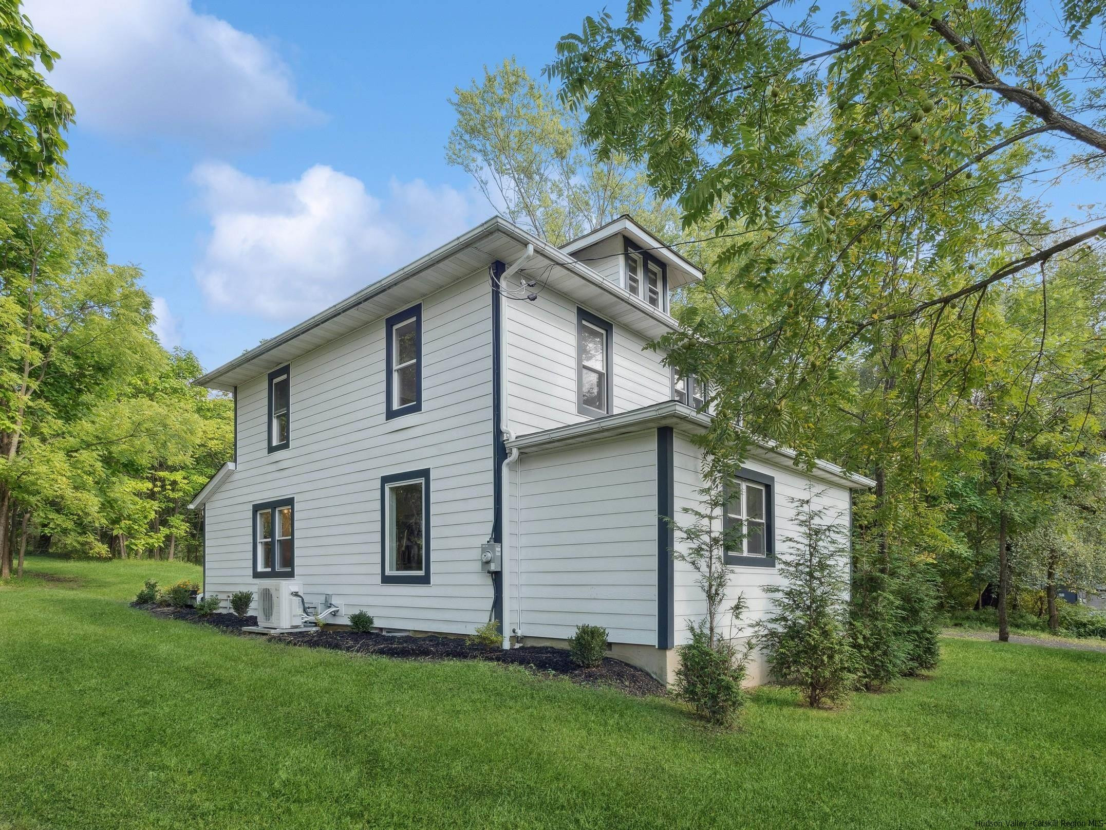 37 Towpath Road Accord, NY 12404 - Photo 3 of 29 a front view of house with yard and green space