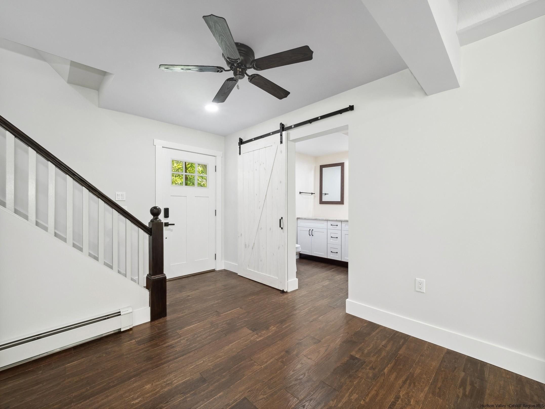 37 Towpath Road Accord, NY 12404 - Photo 5 of 29 a view of a ceiling fan and wooden floor in a room
