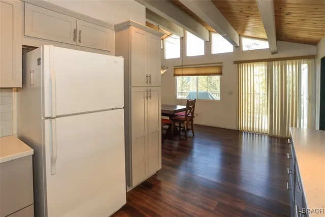 a kitchen with counter top space and a window