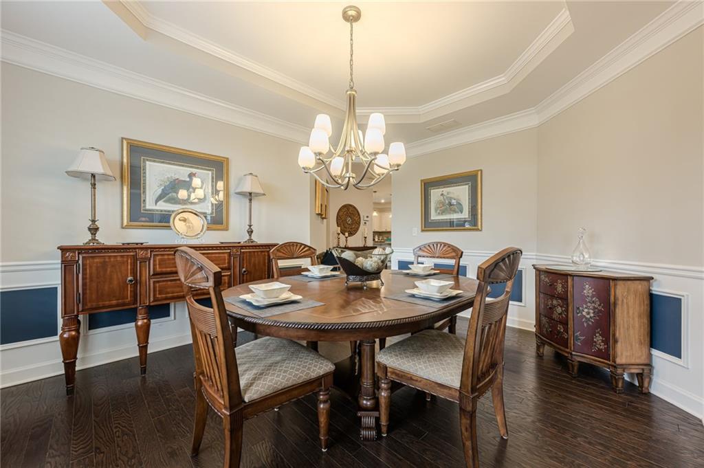 5515 Cheatam Avenue Cumming, GA 30040 - Photo 12 of 99 a view of a dining room with furniture window and wooden floor