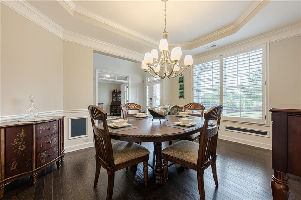 5515 Cheatam Avenue Cumming, GA 30040 - Photo 14 of 99 a view of a dining room with furniture window and wooden floor