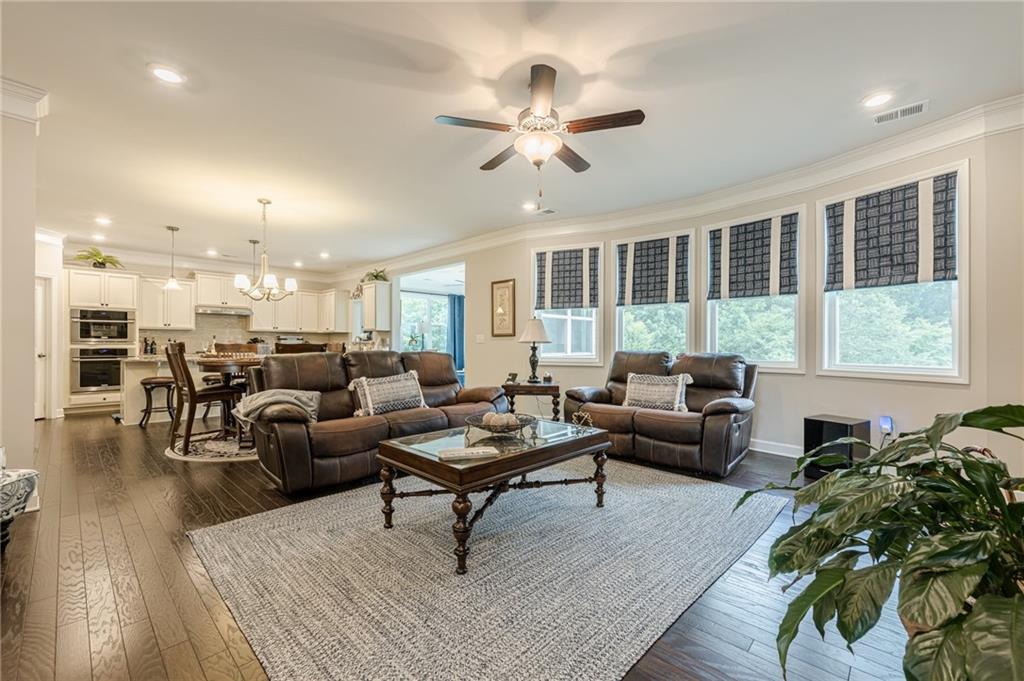 5515 Cheatam Avenue Cumming, GA 30040 - Photo 15 of 99 a living room with furniture and a large window