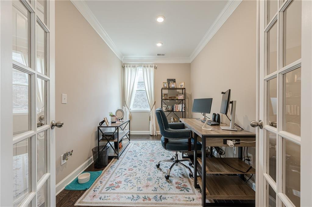 5515 Cheatam Avenue Cumming, GA 30040 - Photo 19 of 99 a workspace with furniture and a rug