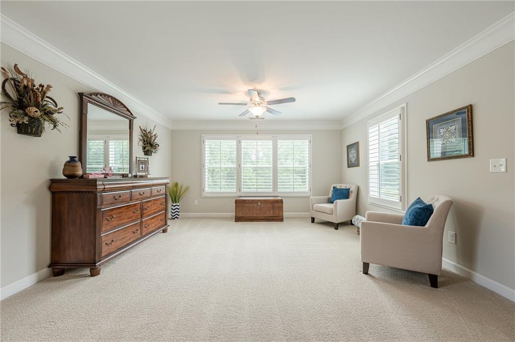 5515 Cheatam Avenue Cumming, GA 30040 - Photo 41 of 99 a large living room with furniture and a large window