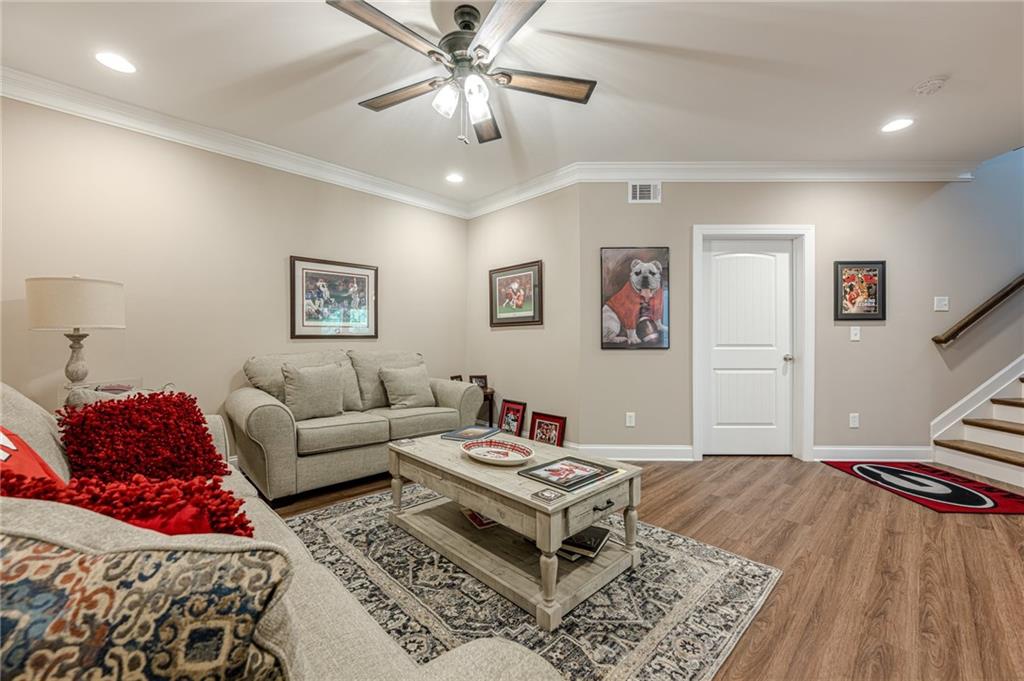 5515 Cheatam Avenue Cumming, GA 30040 - Photo 65 of 99 a living room with furniture and a couch