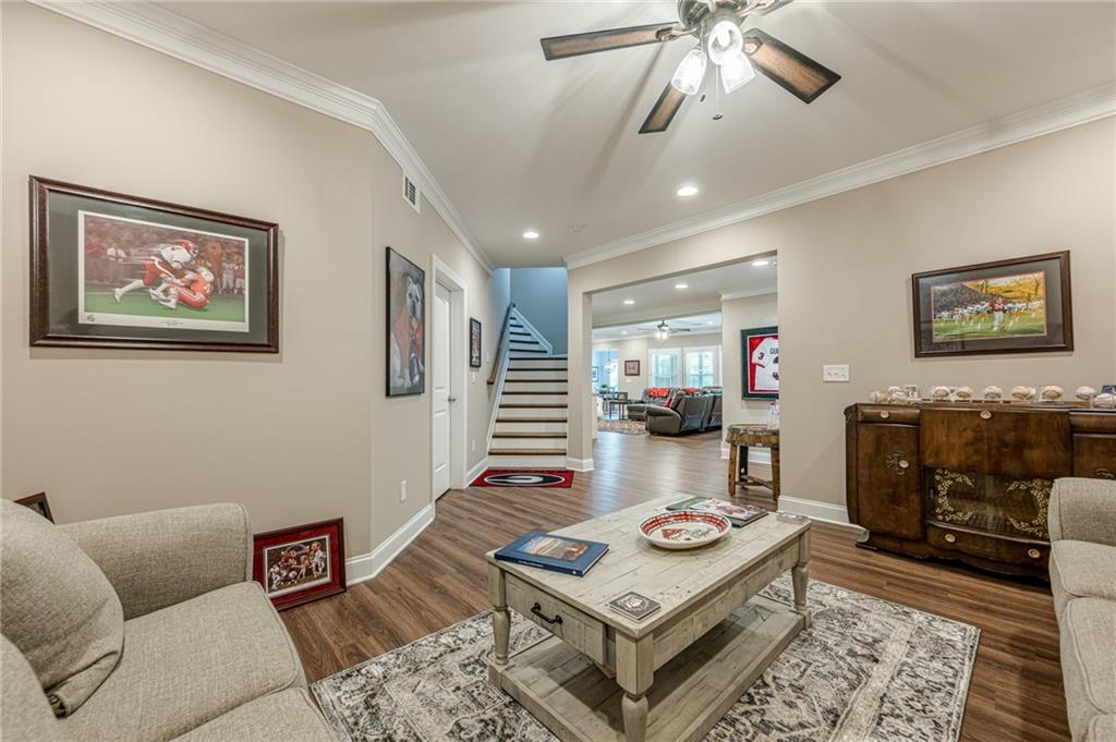 5515 Cheatam Avenue Cumming, GA 30040 - Photo 66 of 99 a living room with furniture and a rug