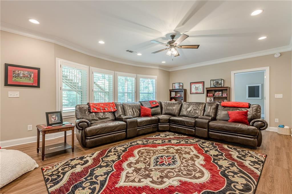 5515 Cheatam Avenue Cumming, GA 30040 - Photo 70 of 99 a living room with furniture and a rug