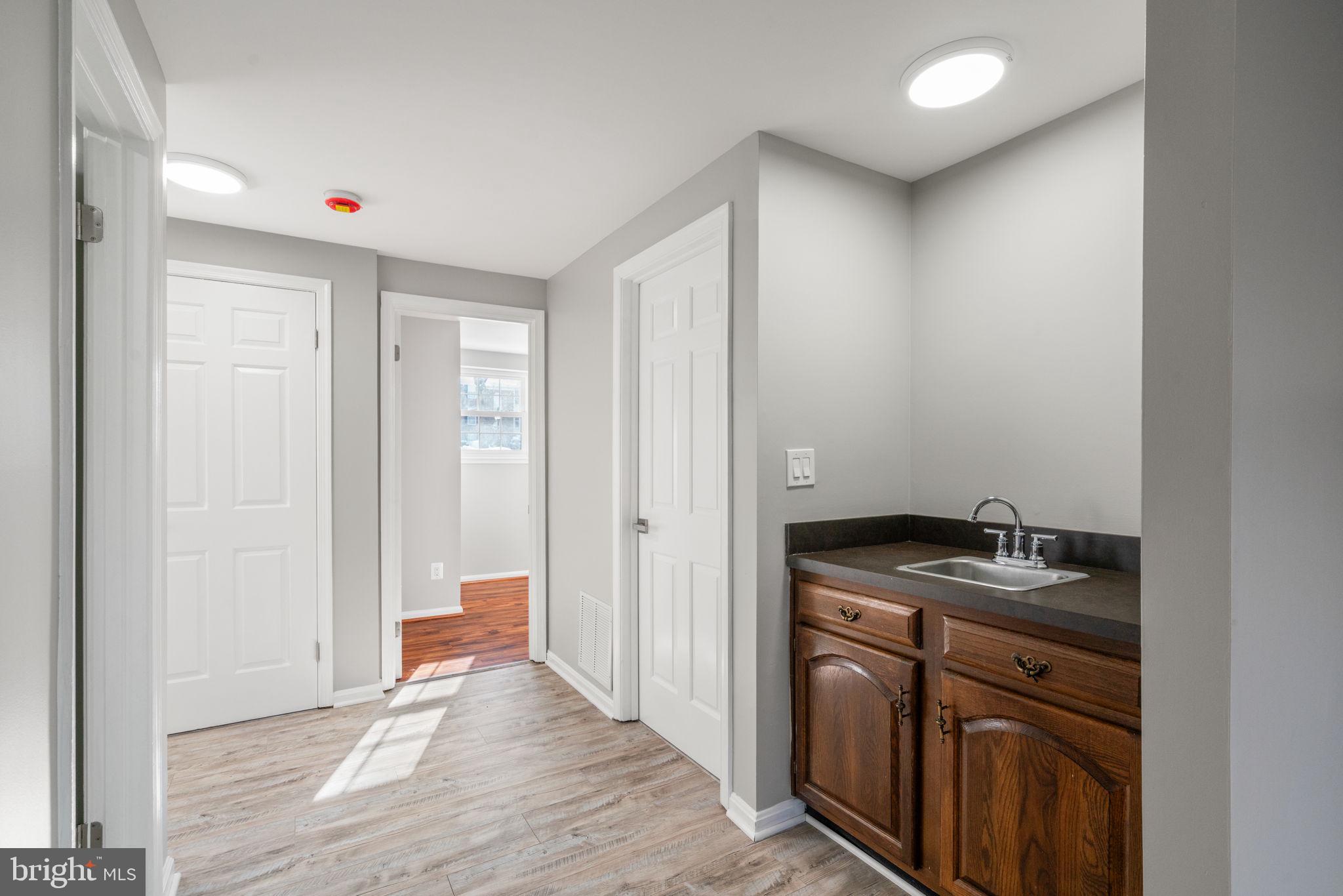 7020 Braddock Mews Place Springfield, VA 22151 - Photo 32 of 45 Basement with Wet Bar