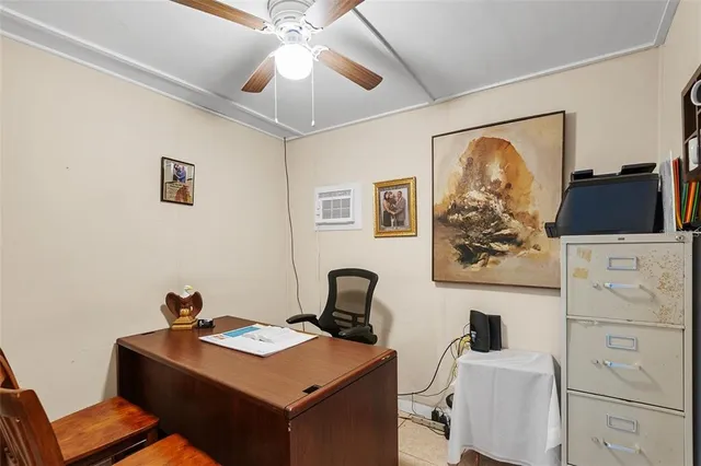 a view of a workspace with furniture