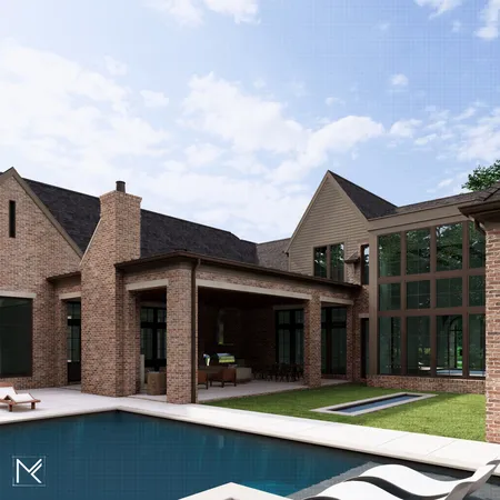 a view of a house with floor to ceiling windows and a yard