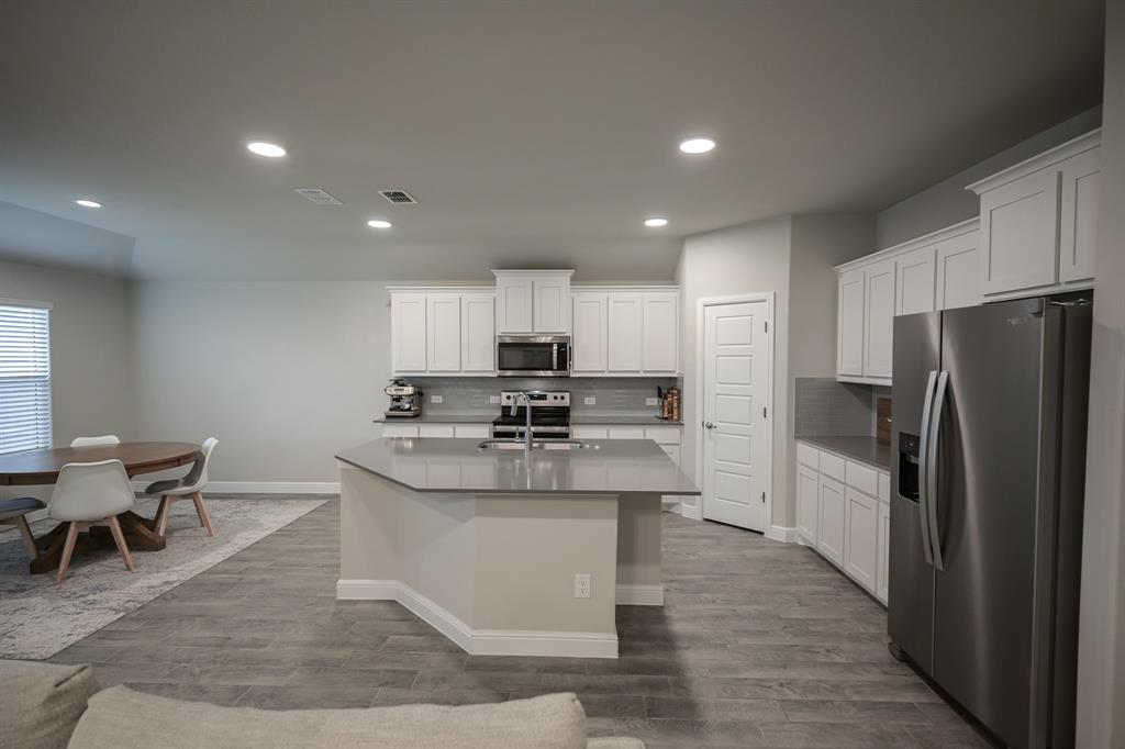 725 Golden Gate Pk Road Alvarado, TX 76009 - Photo 13 of 35 Lots of cabinet and counter top space