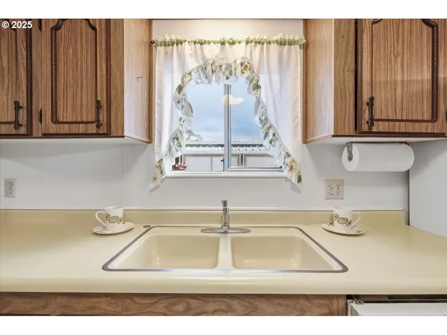 a view of a sink with wooden floor