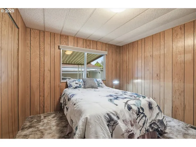 a bathroom with a sink vanity and a mirror