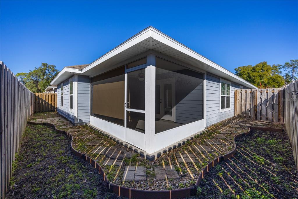 470 Southwest 251st Street Newberry, FL 32669 - Photo 30 of 33 a view of a house with a yard