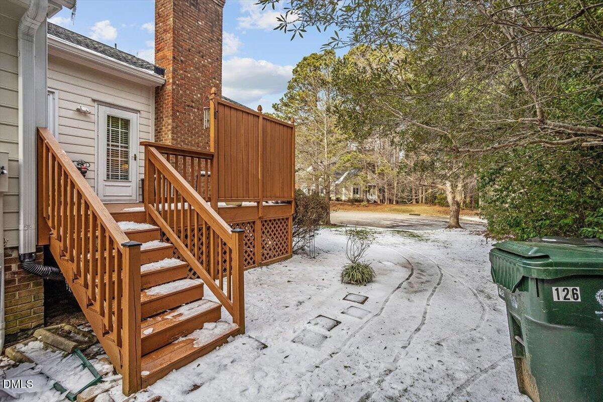 126 Skylark Way Raleigh, NC 27615 - Photo 6 of 29 a view of street with wooden fence