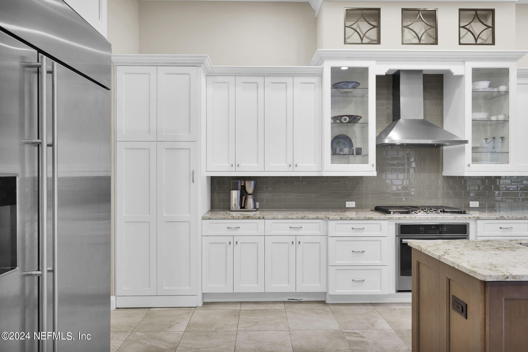 125 Senora Court St. Augustine, FL 32095 - Photo 17 of 109 Concealed Pantry & Gas Cooktop