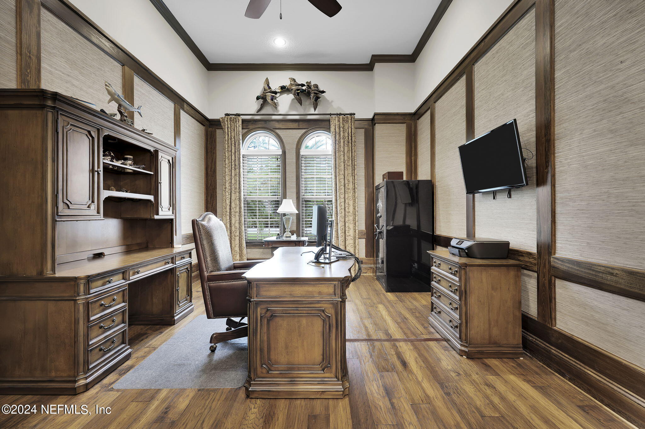 125 Senora Court St. Augustine, FL 32095 - Photo 33 of 109 a living room with stainless steel appliances furniture a flat screen tv and kitchen view