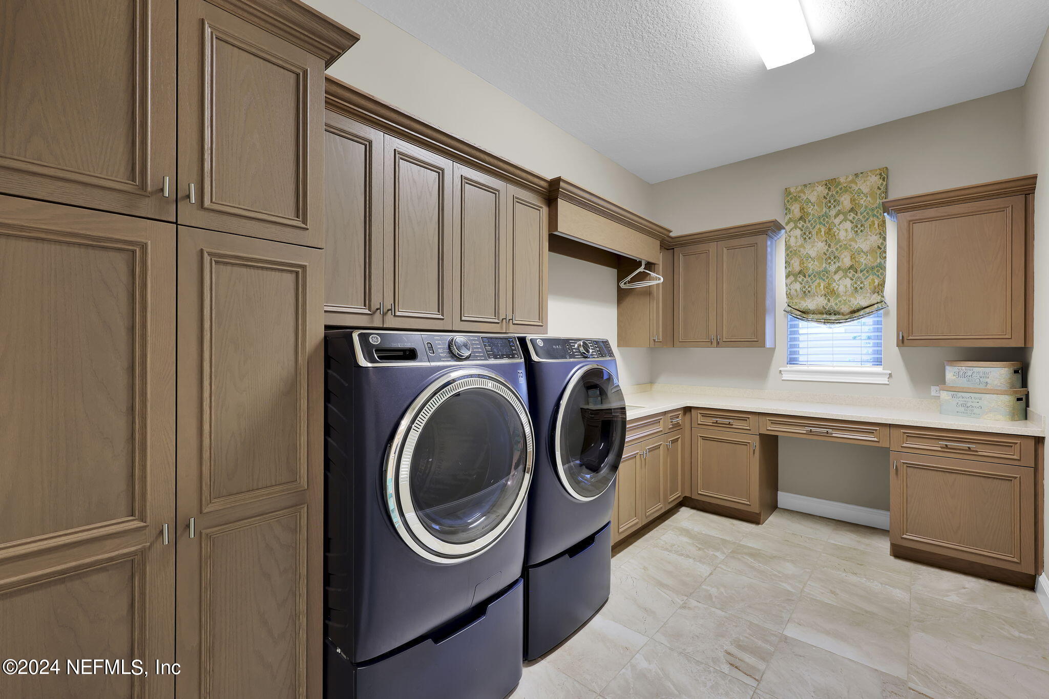 125 Senora Court St. Augustine, FL 32095 - Photo 35 of 109 a utility room with sink dryer and washer