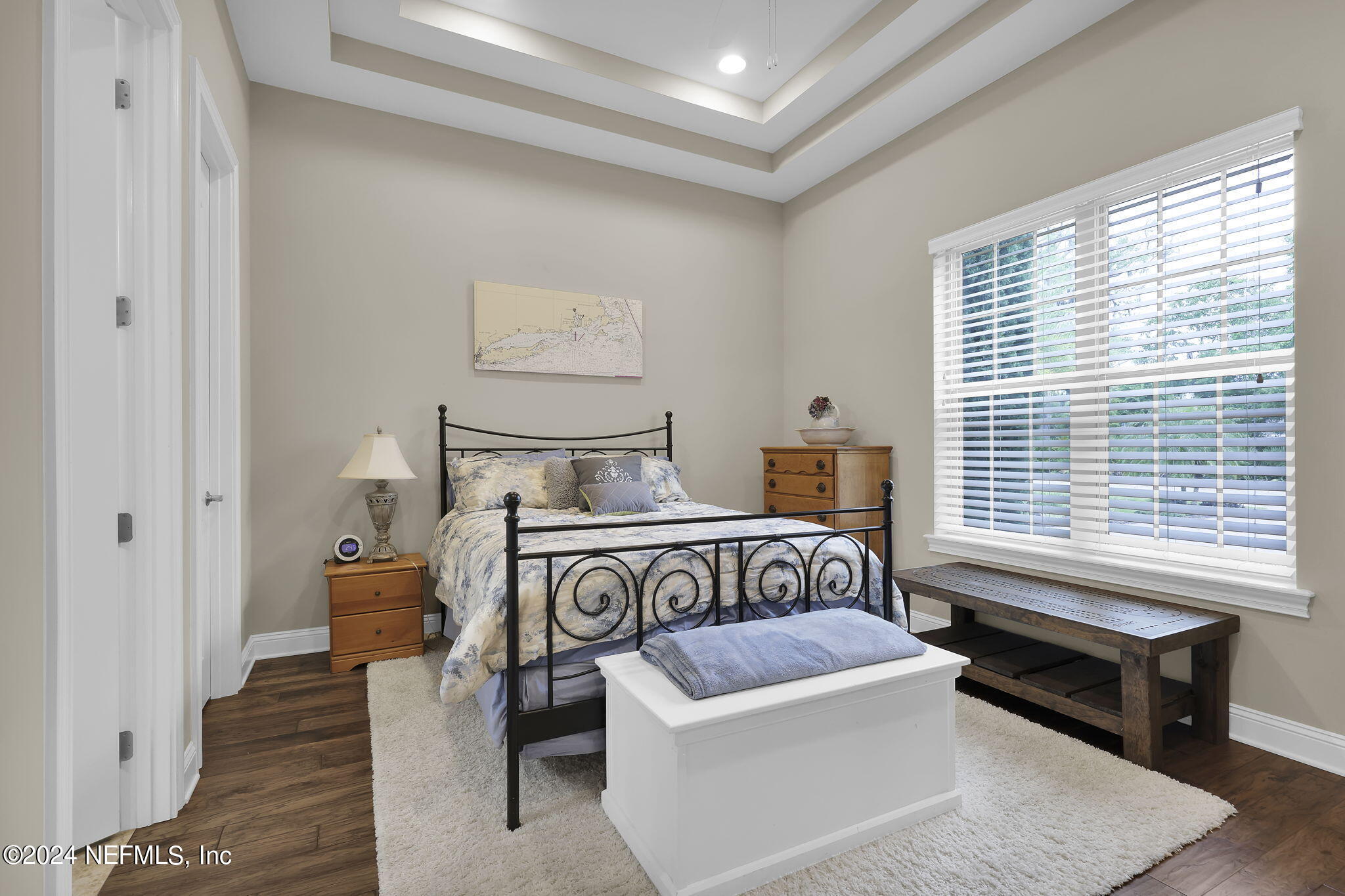 125 Senora Court St. Augustine, FL 32095 - Photo 45 of 109 a bedroom with a bed and a table in it