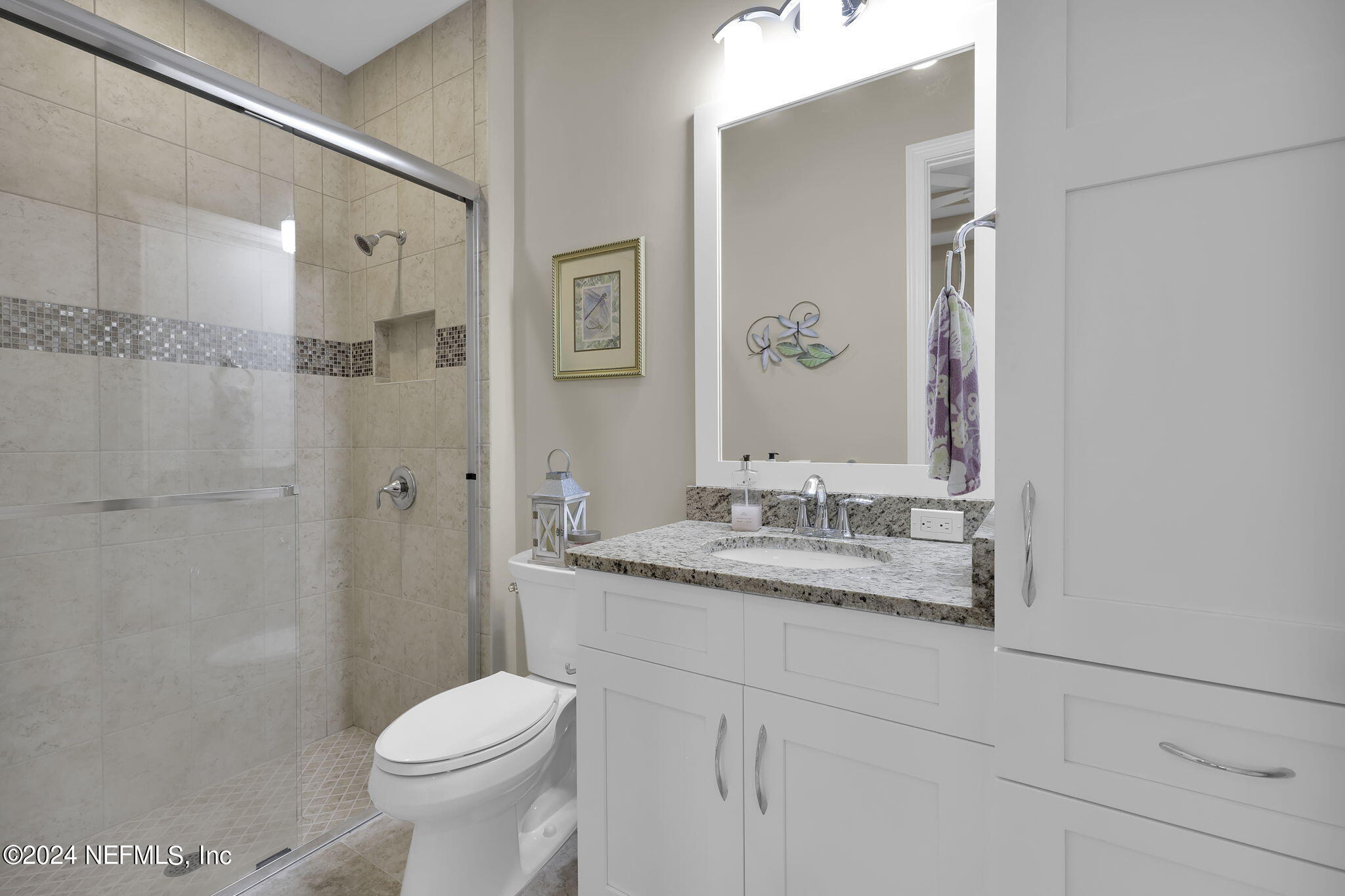 125 Senora Court St. Augustine, FL 32095 - Photo 46 of 109 a bathroom with a granite countertop sink toilet and shower