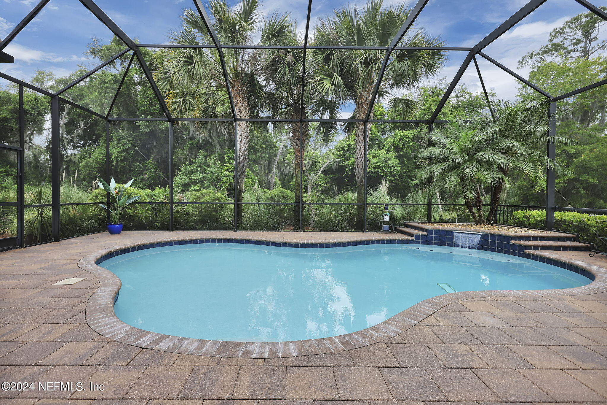 125 Senora Court St. Augustine, FL 32095 - Photo 5 of 109 a view of a swimming pool with a yard and sitting area