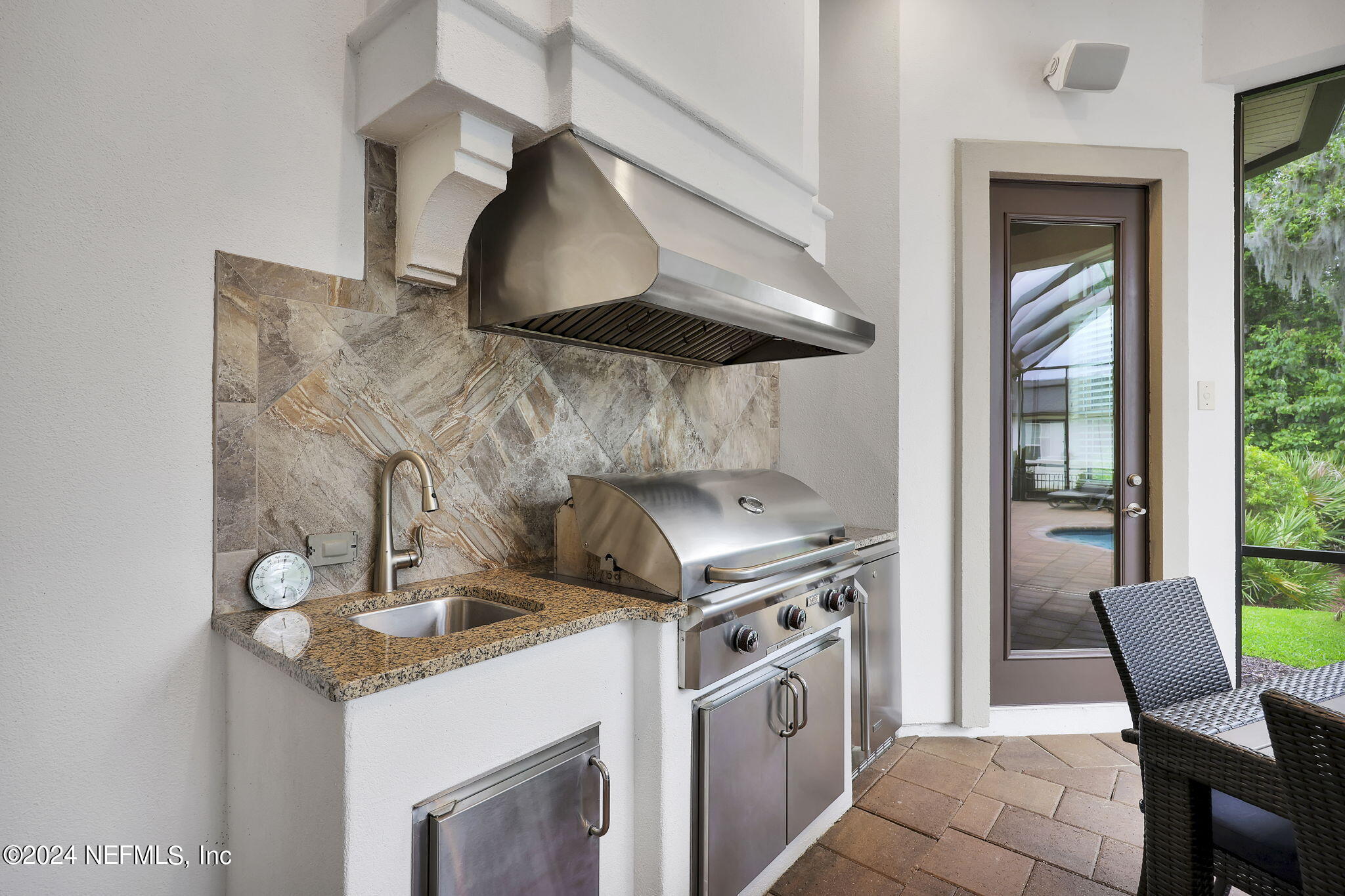 125 Senora Court St. Augustine, FL 32095 - Photo 57 of 109 a kitchen with a stove and a table