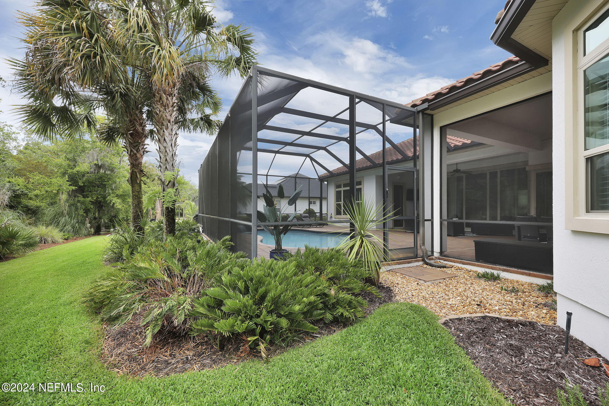 125 Senora Court St. Augustine, FL 32095 - Photo 59 of 109 a view of a chair and table in backyard of the house