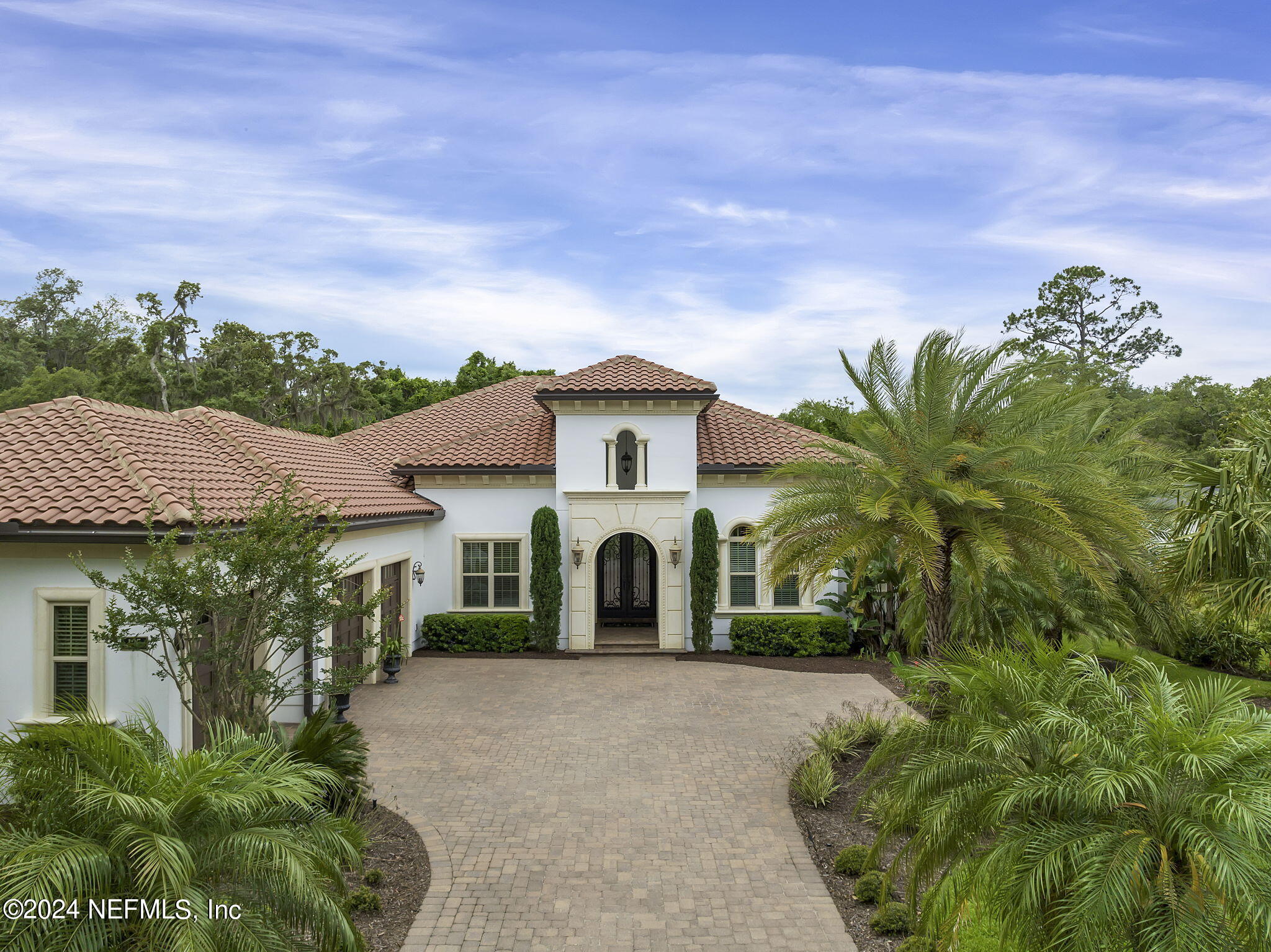 125 Senora Court St. Augustine, FL 32095 - Photo 70 of 109 a front view of a house with a garden
