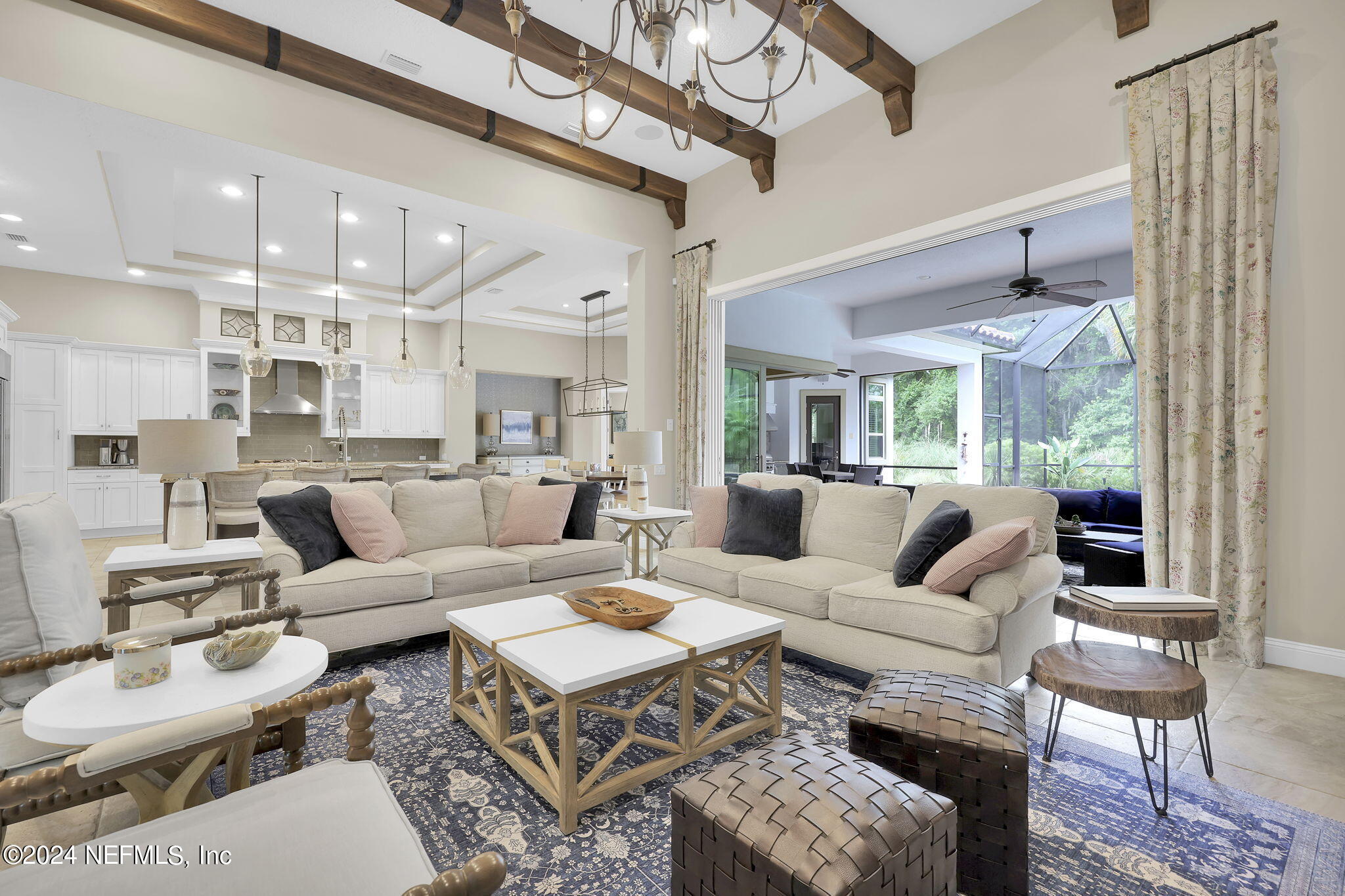 125 Senora Court St. Augustine, FL 32095 - Photo 7 of 109 a living room with furniture wooden floor and a chandelier