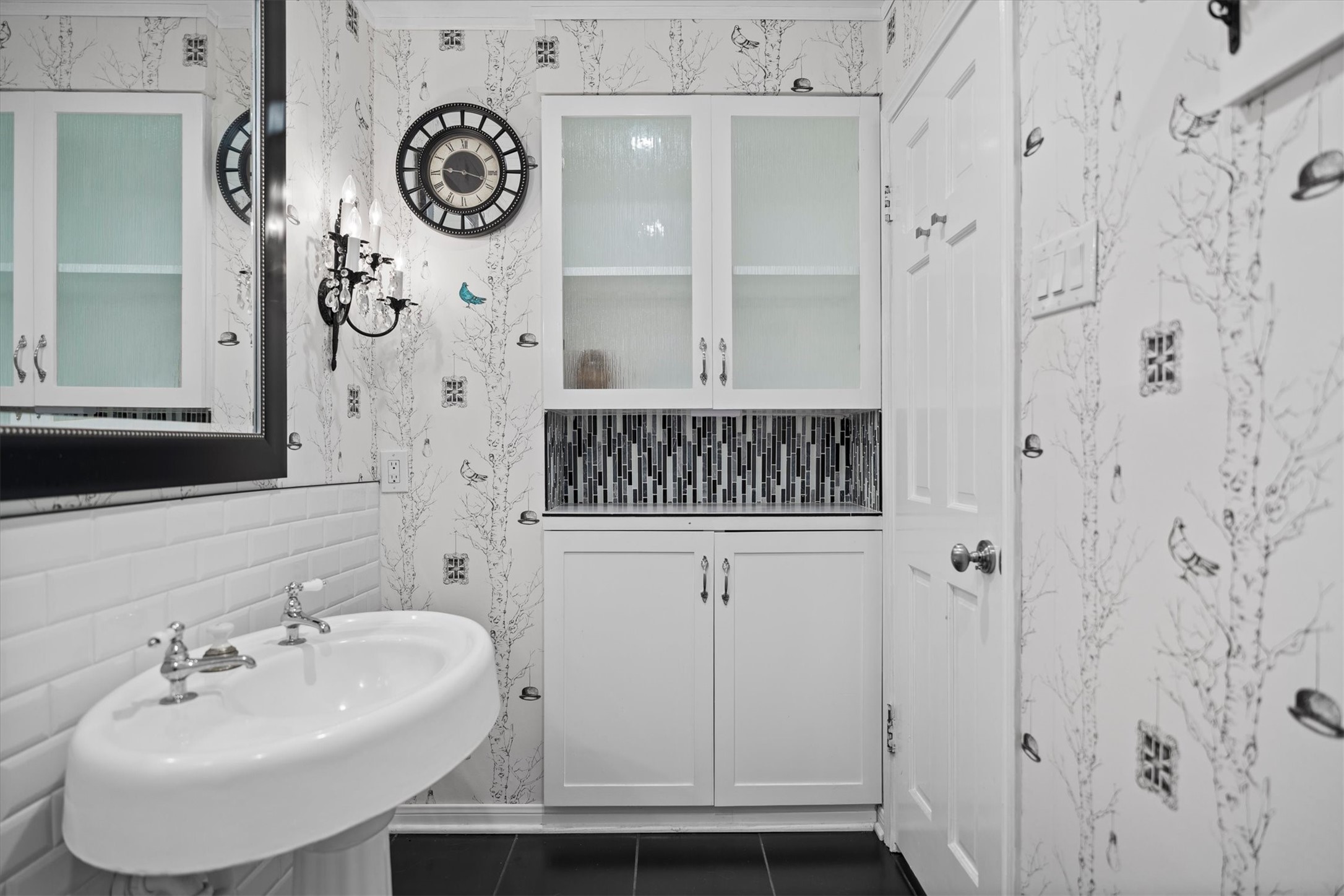 25319 Old Carriage Lane Spring, TX 77373 - Photo 27 of 35 a bathroom with a sink and a mirror