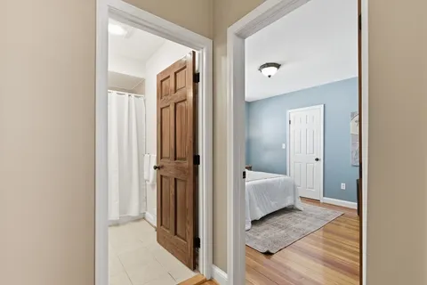 a view of a bathroom from the hallway
