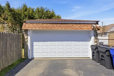 a front view of a house with a garage