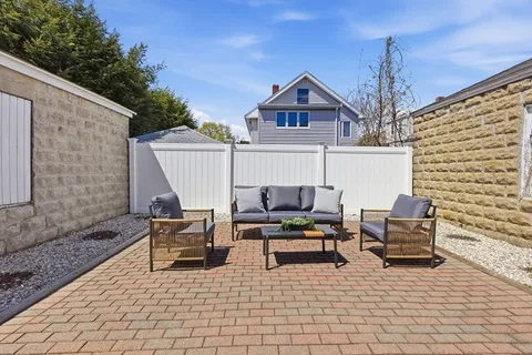 a building outdoor space with patio furniture